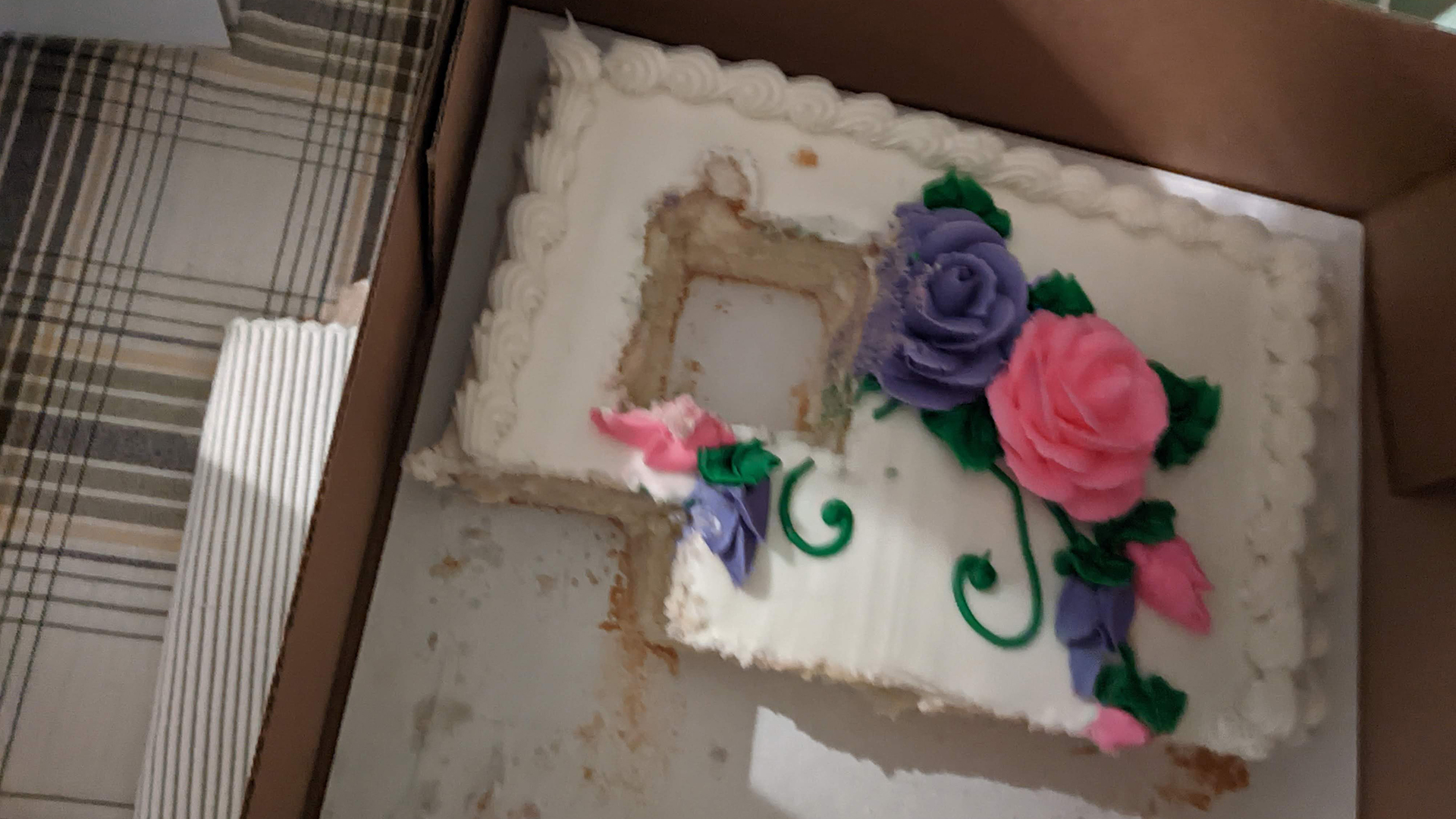 picture of cake with precise cut taken out of it 