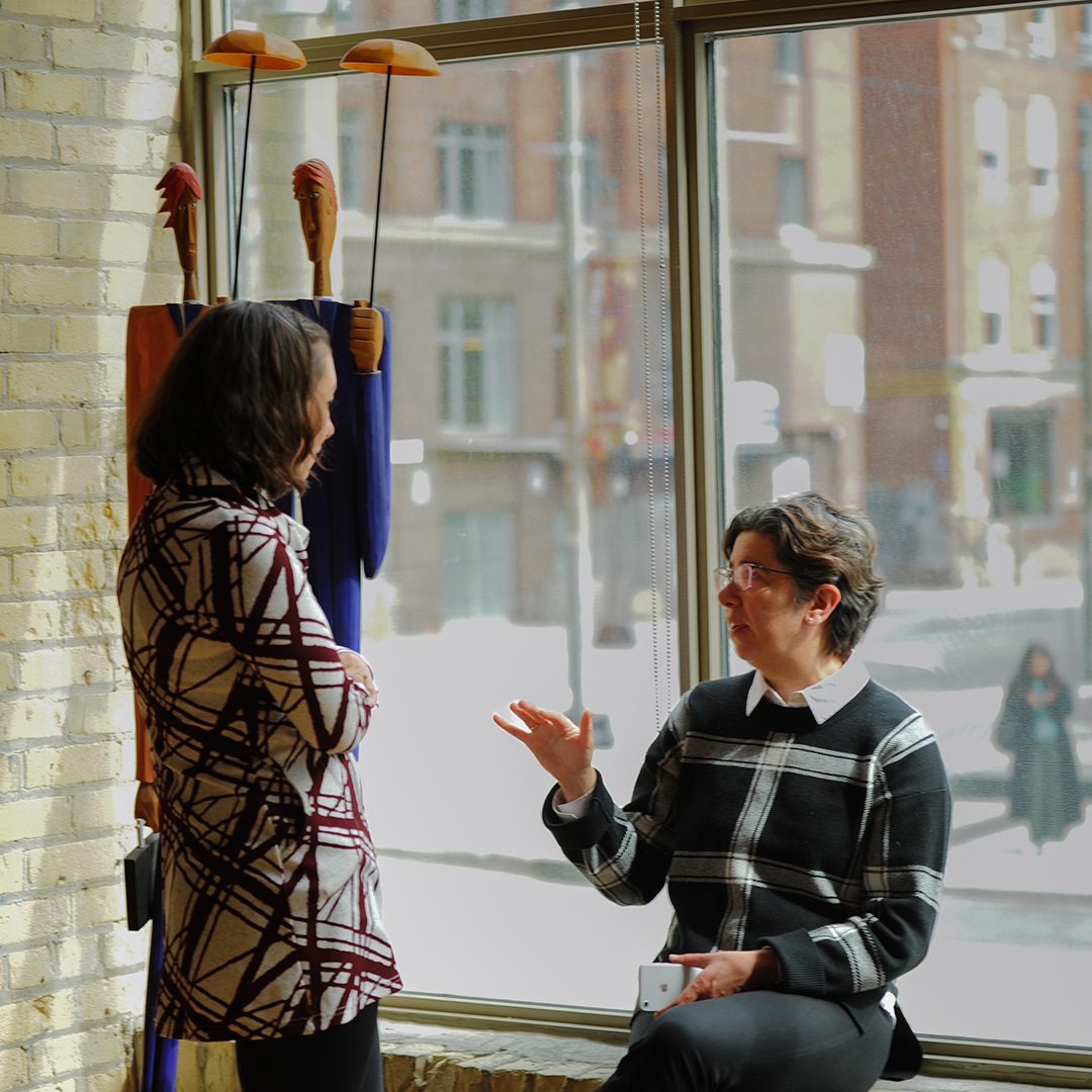 Environics team members, Kait Moreau and Sarah Roberton discussing stakeholder engagement ideation. 