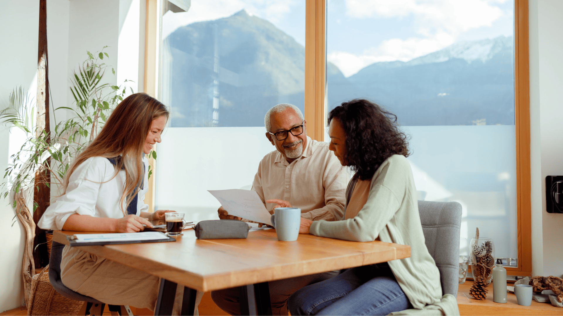 Real estate agent supporting couple making a purchase