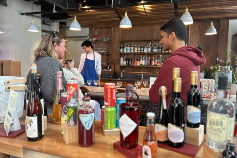 environics team in sobr market tasting drinks