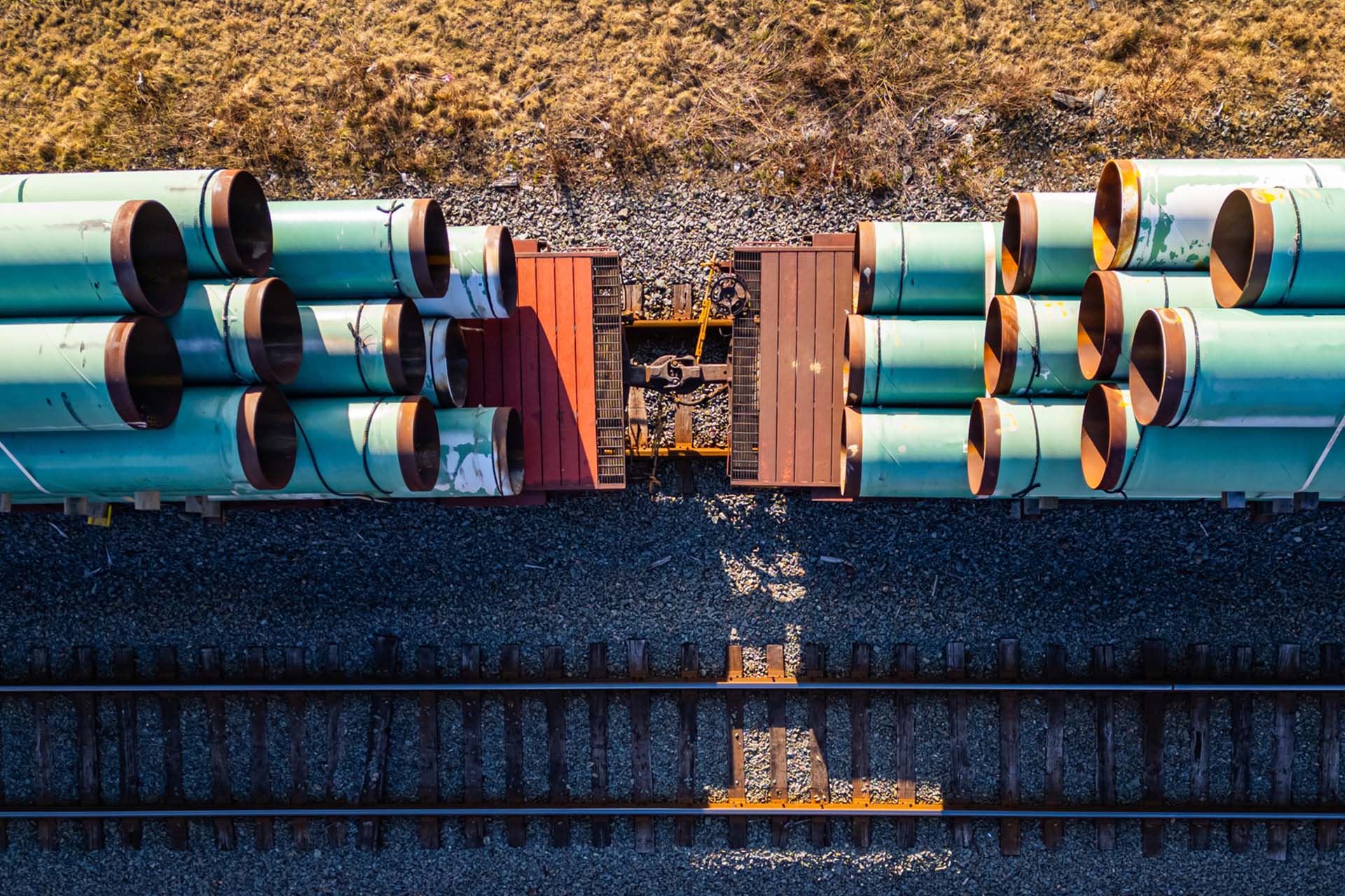 pipes by rail line in canada