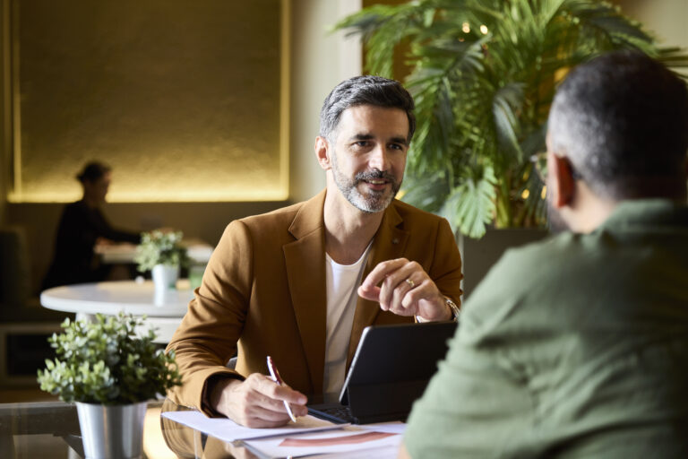 People sitting and talking in office