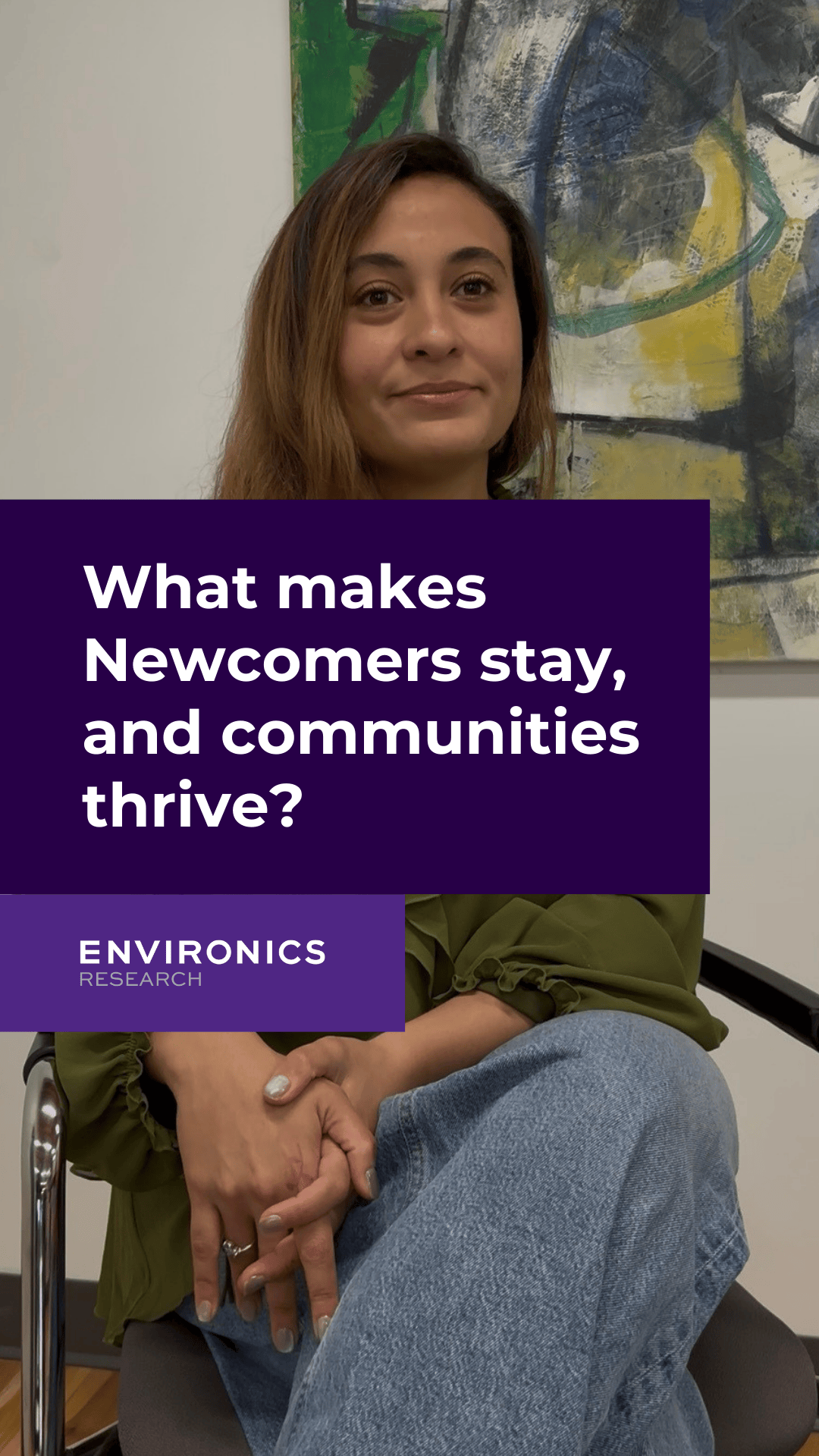 Maysa Husseini sitting and smiling to the camera