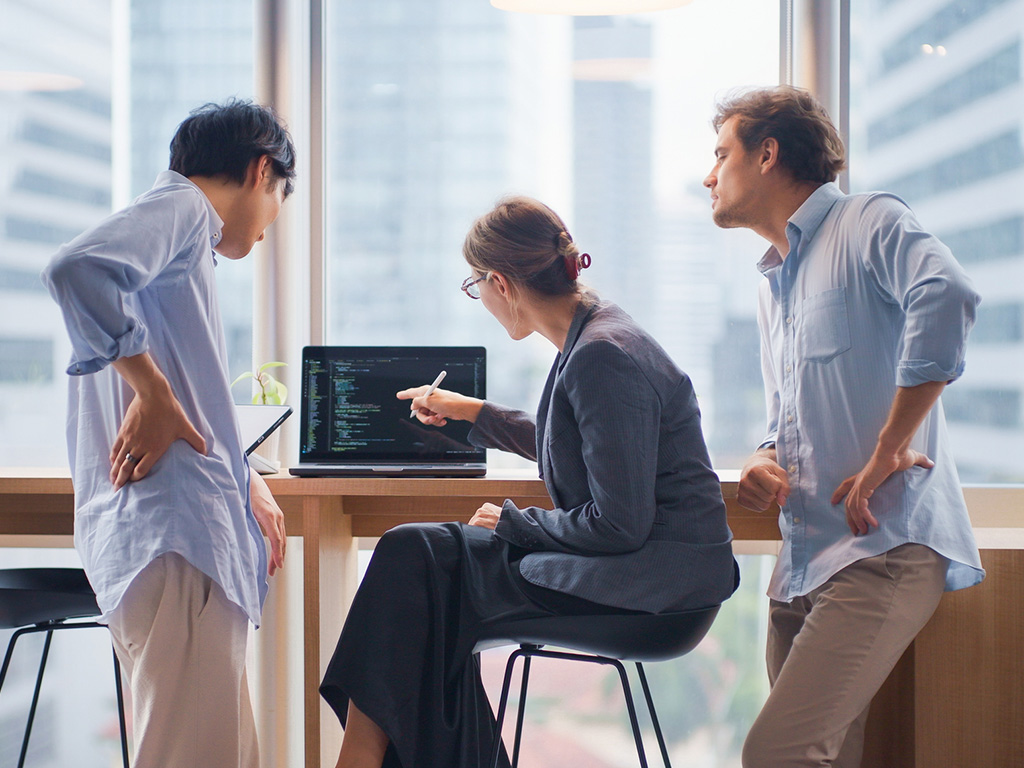 colleagues working in office
