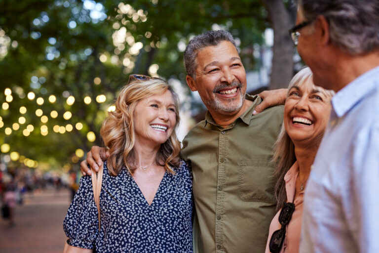 Older adults smiling with each other